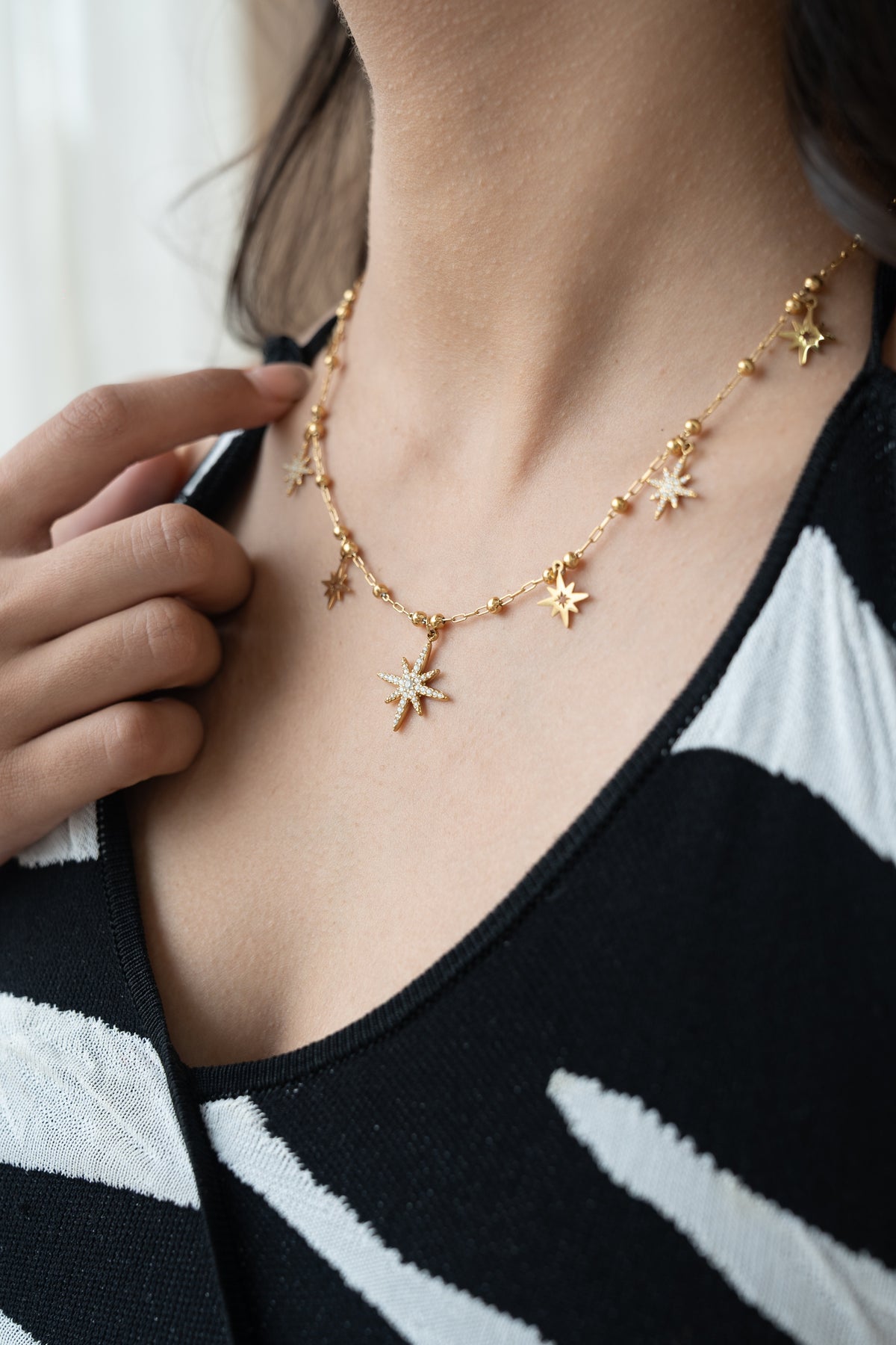 Celestial Star Necklace by MHAARO, Gold Multi Starburst Charms