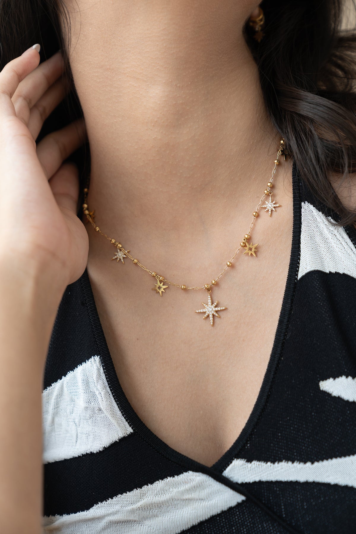 Celestial Star Necklace by MHAARO, Gold Multi Starburst Charms