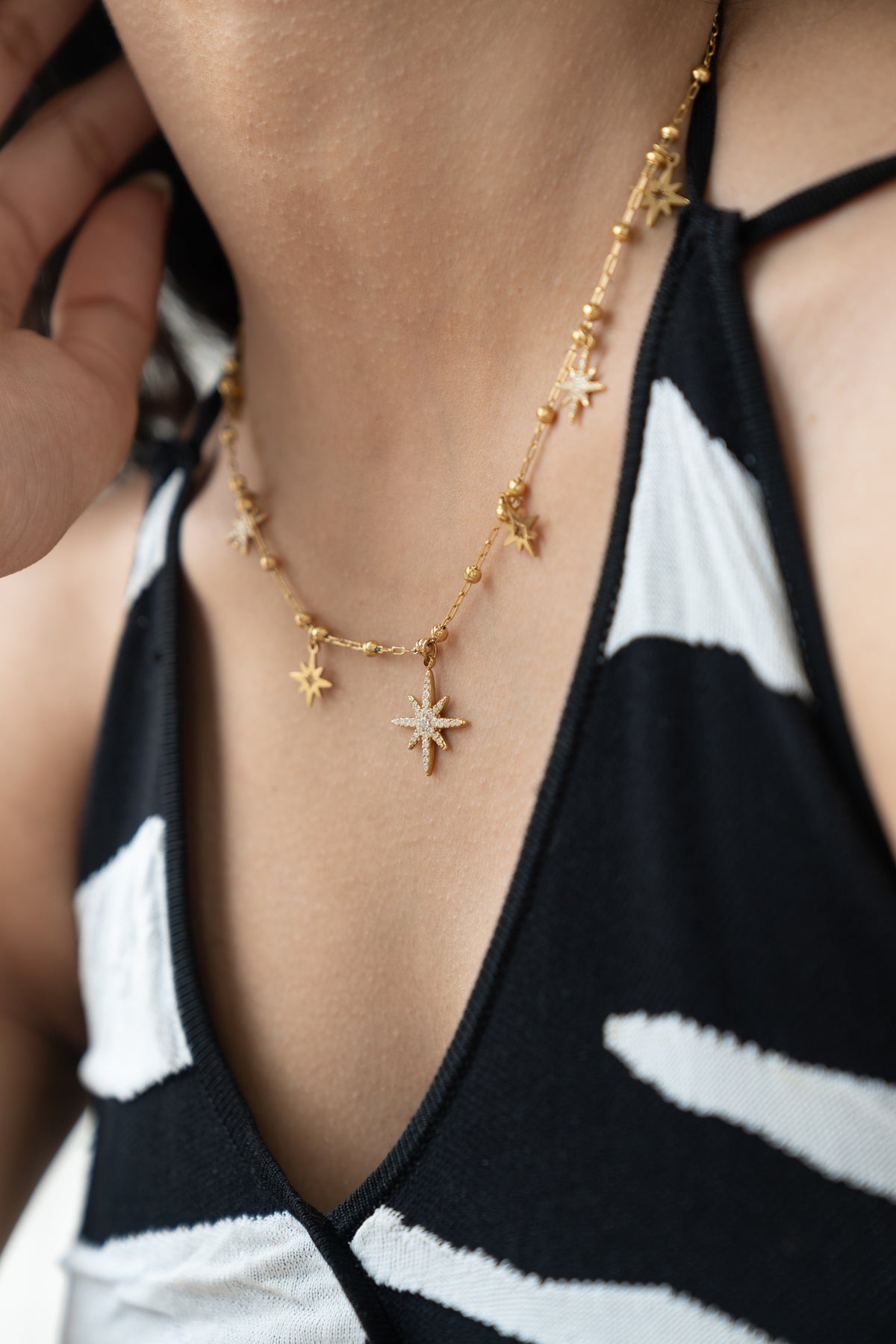 Celestial Star Necklace by MHAARO, Gold Multi Starburst Charms